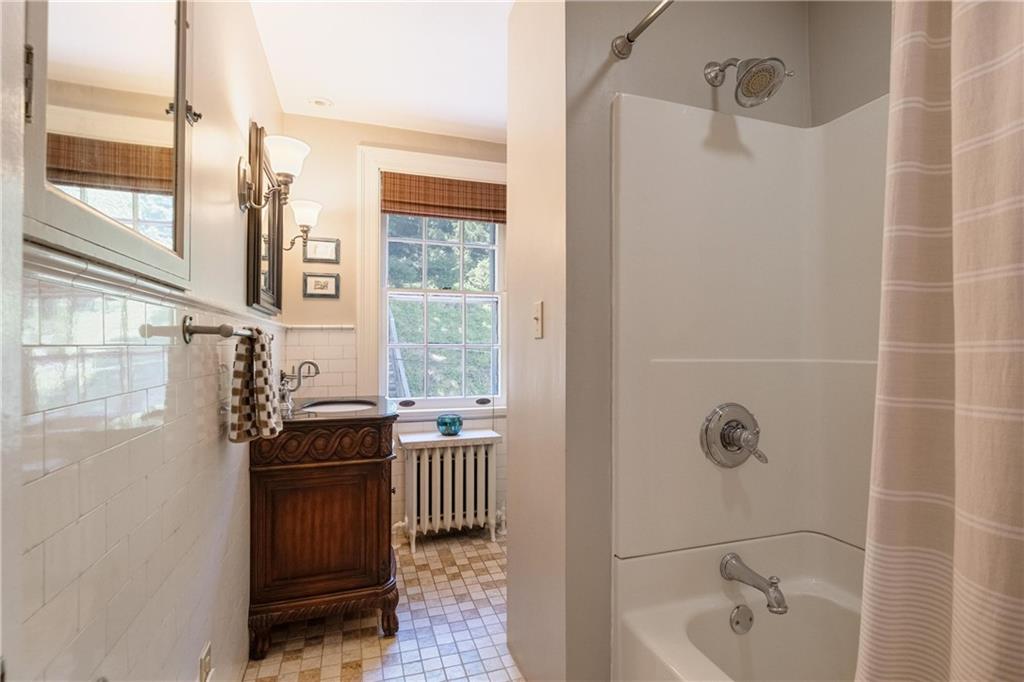 4375 Schenley Farms Terrace Pittsburgh, PA 15213 - Photo 29 of 44 a bath room with a bath tub and a shower