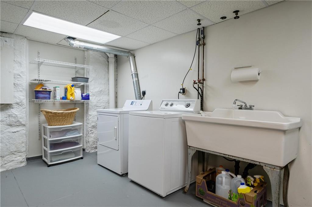 4375 Schenley Farms Terrace Pittsburgh, PA 15213 - Photo 35 of 44 a utility room with cabinets dryer and washer