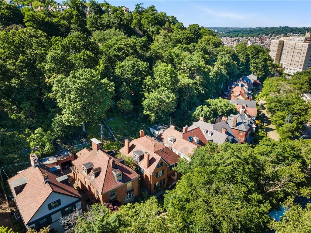 4375 Schenley Farms Terrace Pittsburgh, PA 15213 - Photo 41 of 44 an aerial view of a house with a yard and lake view