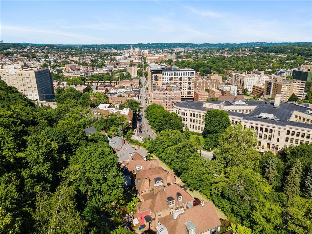 4375 Schenley Farms Terrace Pittsburgh, PA 15213 - Photo 42 of 44 an aerial view of a city with lots of residential buildings ocean and mountain view in back