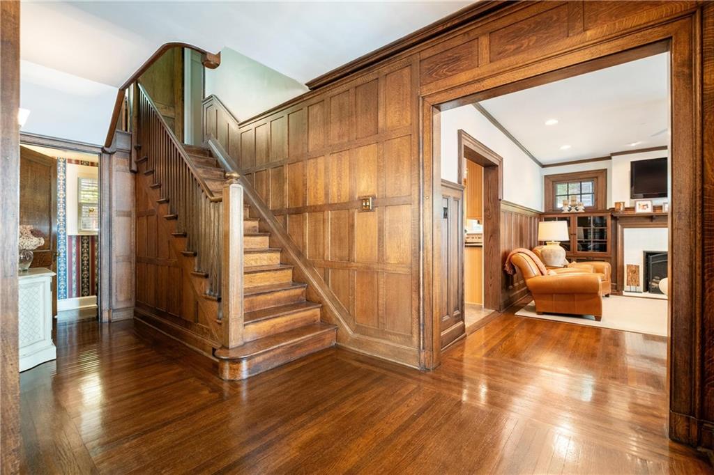 4375 Schenley Farms Terrace Pittsburgh, PA 15213 - Photo 7 of 44 a view of a hallway with wooden floor and staircase