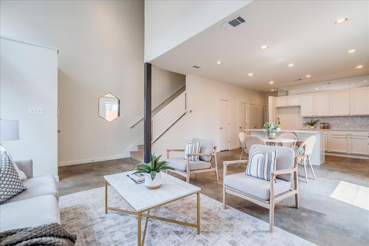 2811 Hardeman Street, Unit B Austin, TX 78704 - Photo 4 of 34 Polished concrete floors and soaring high ceilings define this open architectural living space.