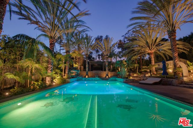 a view of an outdoor space and swimming pool