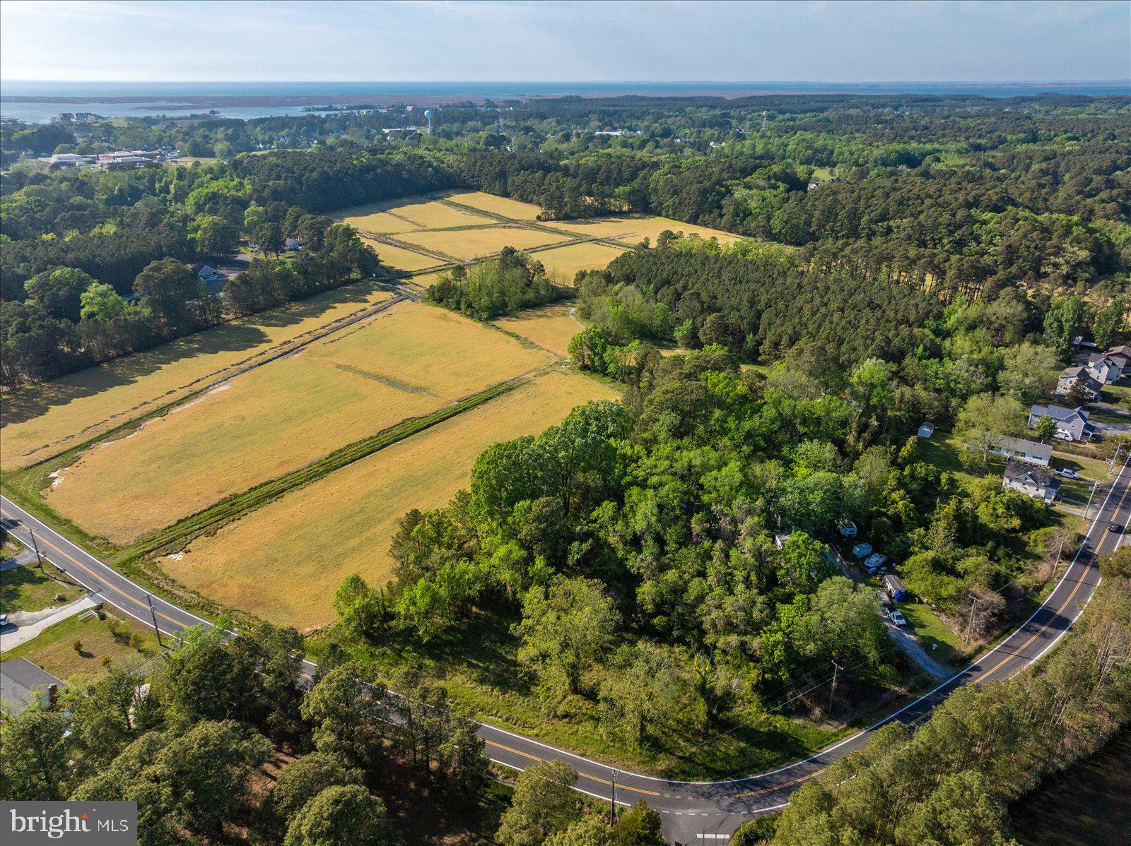 0 Old State Road Crisfield, MD 21817 - Photo 4 of 28 an aerial view of residential houses with outdoor space and trees