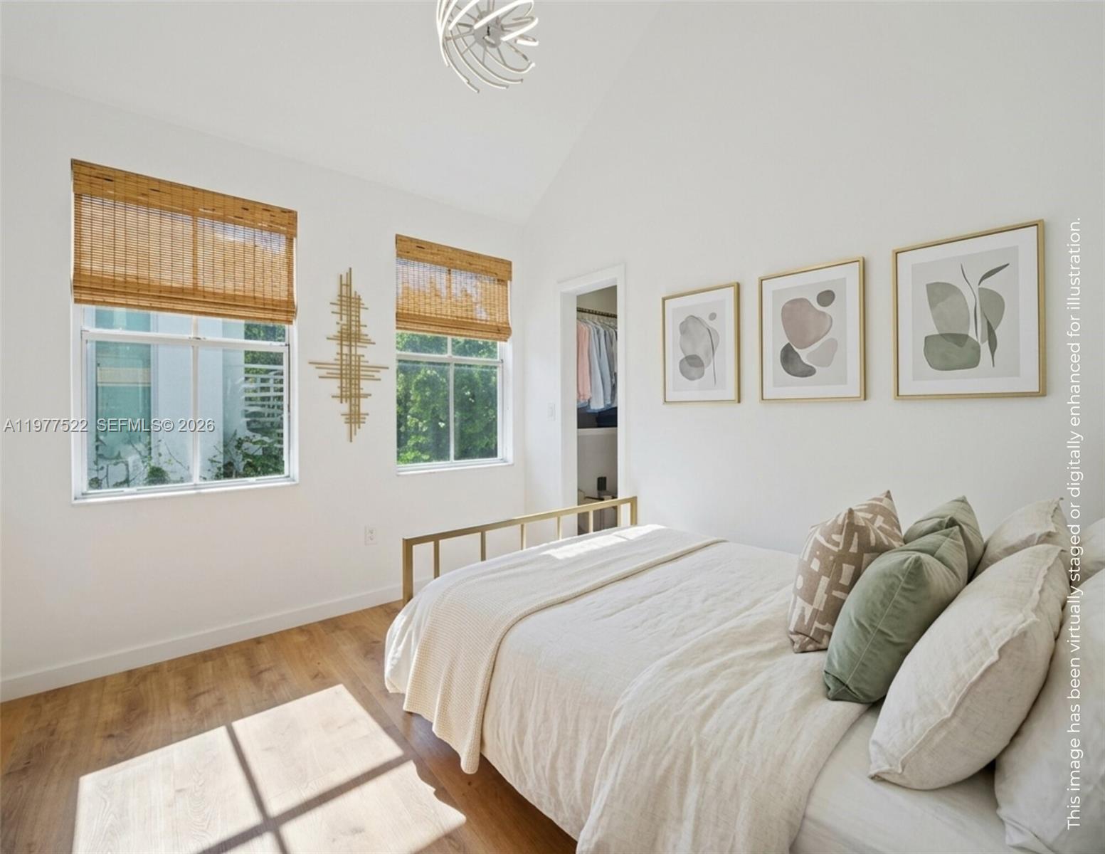 2976 Bird Avenue, Unit 18 Miami, FL 33133 - Photo 8 of 11 a bedroom with a bed and a window
