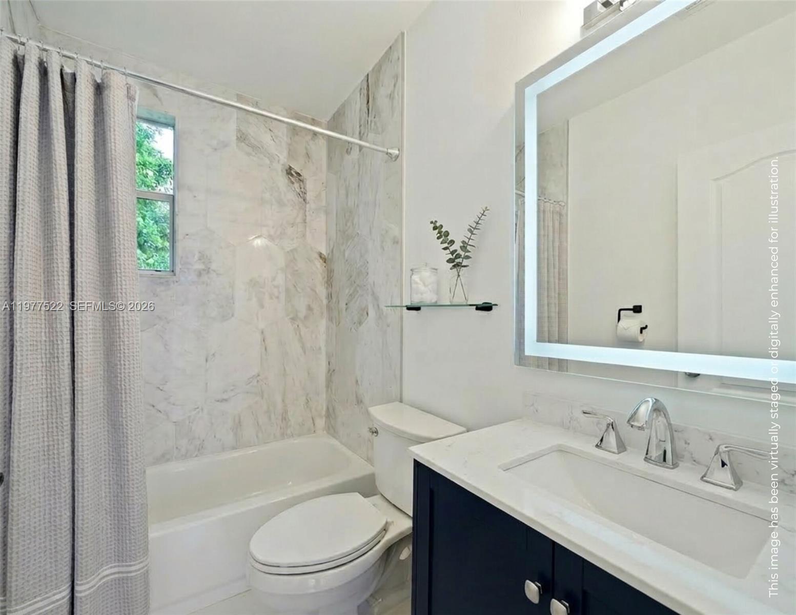 2976 Bird Avenue, Unit 18 Miami, FL 33133 - Photo 10 of 11 a bathroom with a sink toilet a mirror and shower