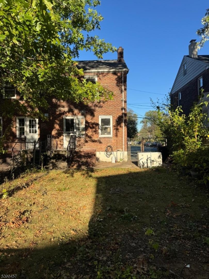 374 Raleigh Road Rahway, NJ 07065 - Photo 11 of 11 a view of a house with a yard