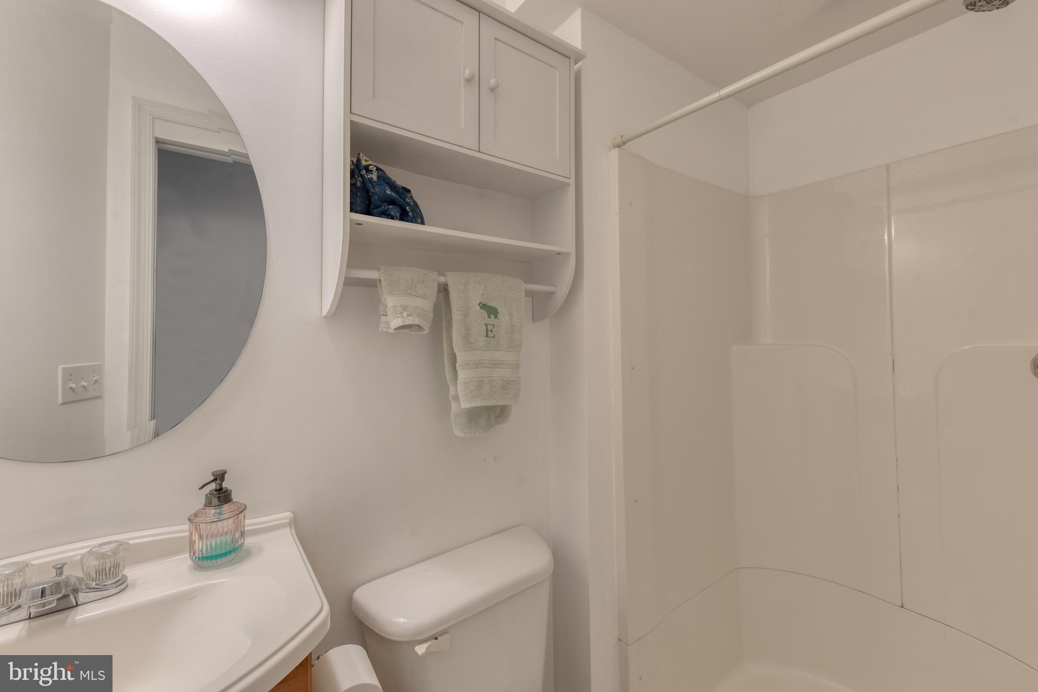 1818 Bank Street Baltimore, MD 21231 - Photo 14 of 20 a bathroom with a toilet and a sink