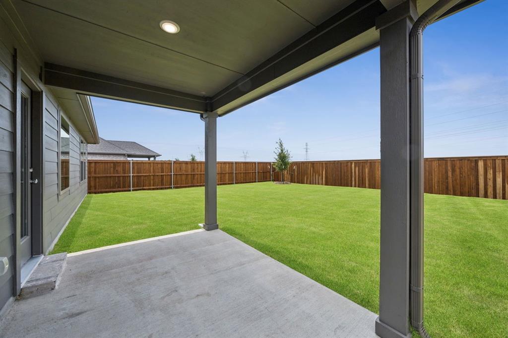 1144 Del Rio Drive Lavon, TX 75166 - Photo 22 of 27 Patio in the Hadley home plan by Trophy Signature Homes – REPRESENTATIVE PHOTO
