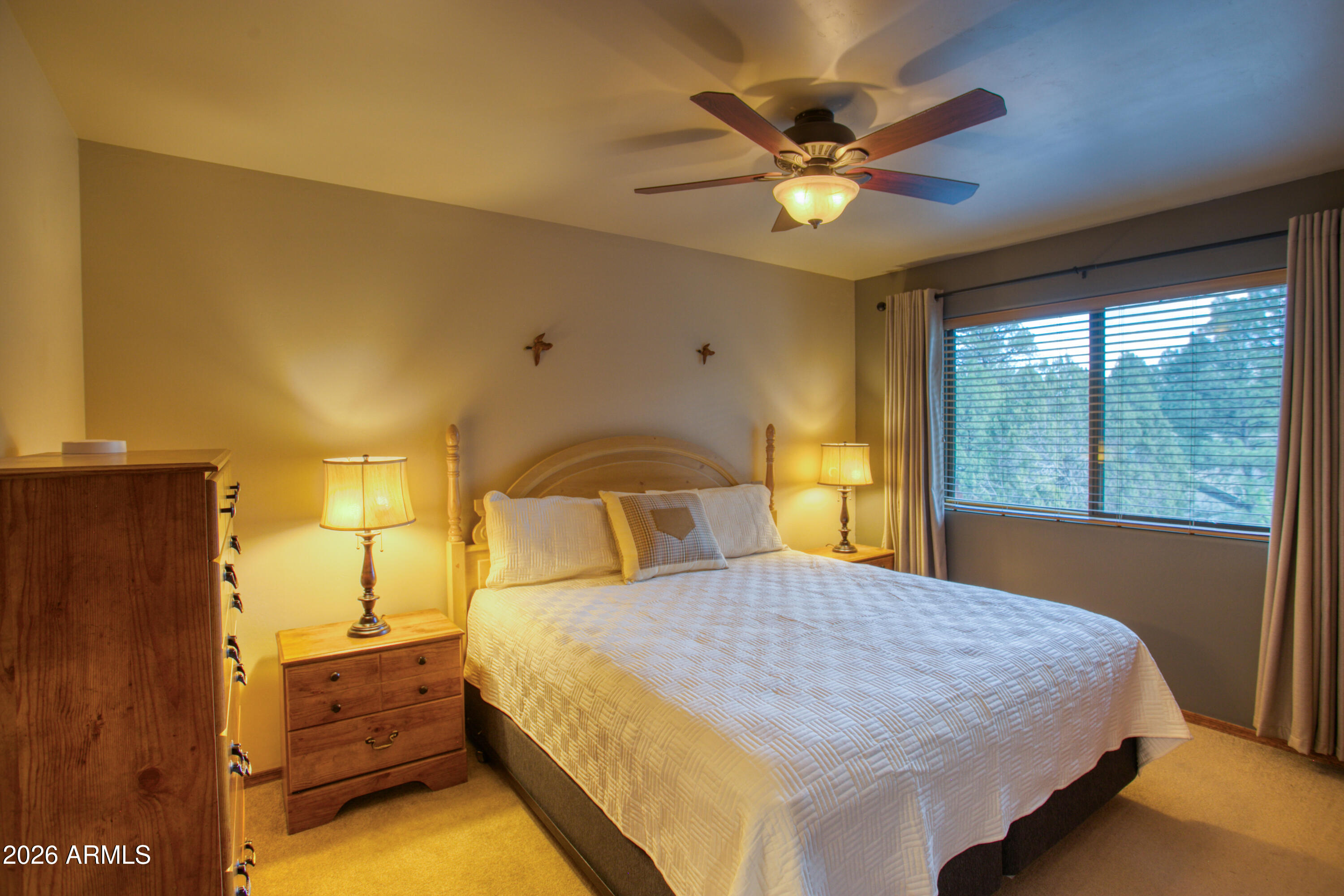 4840 West Cottage Loop Show Low, AZ 85901 - Photo 19 of 47 a bedroom with a bed and window
