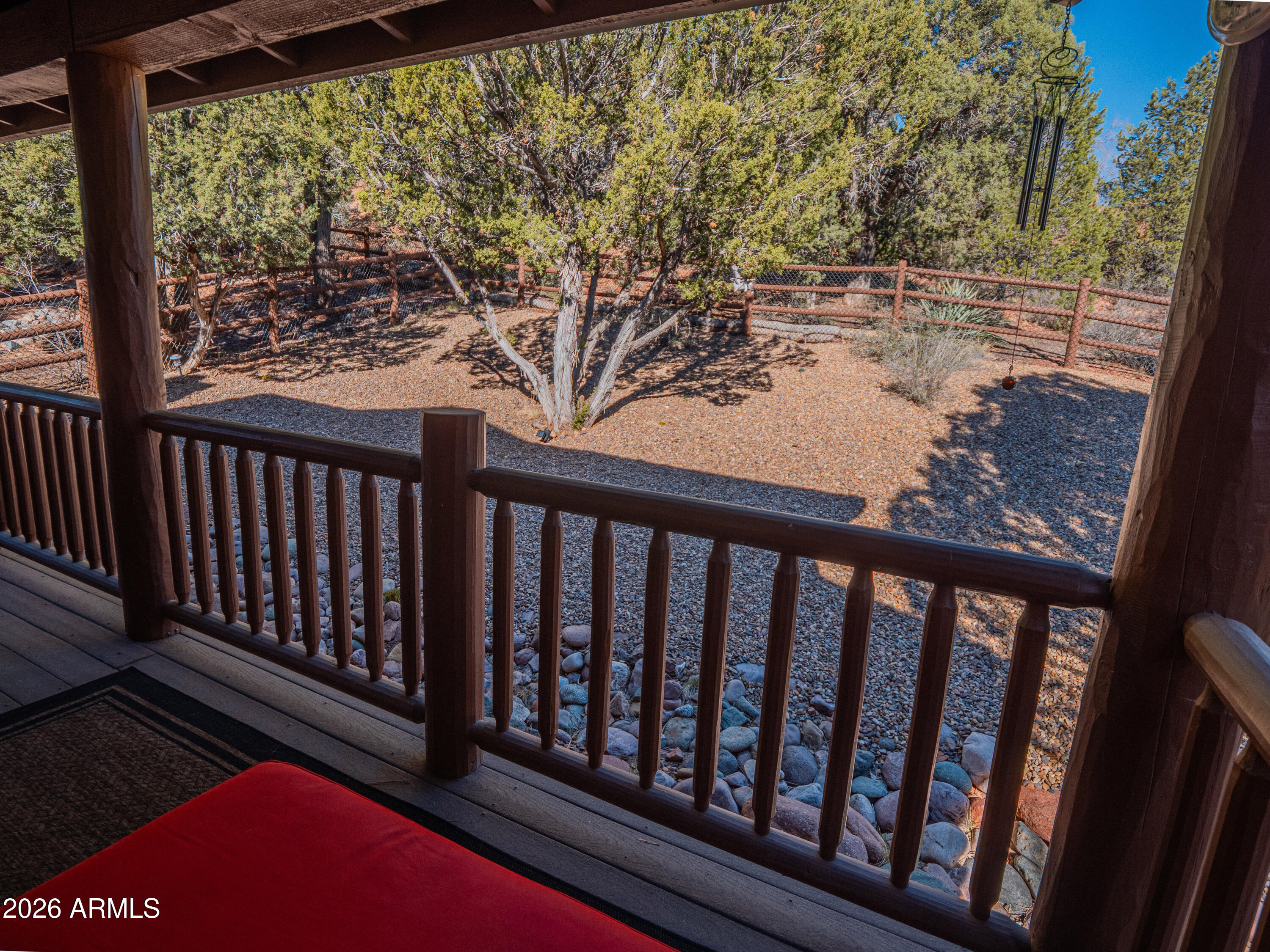 4840 West Cottage Loop Show Low, AZ 85901 - Photo 27 of 47 a view of a porch with wooden floor