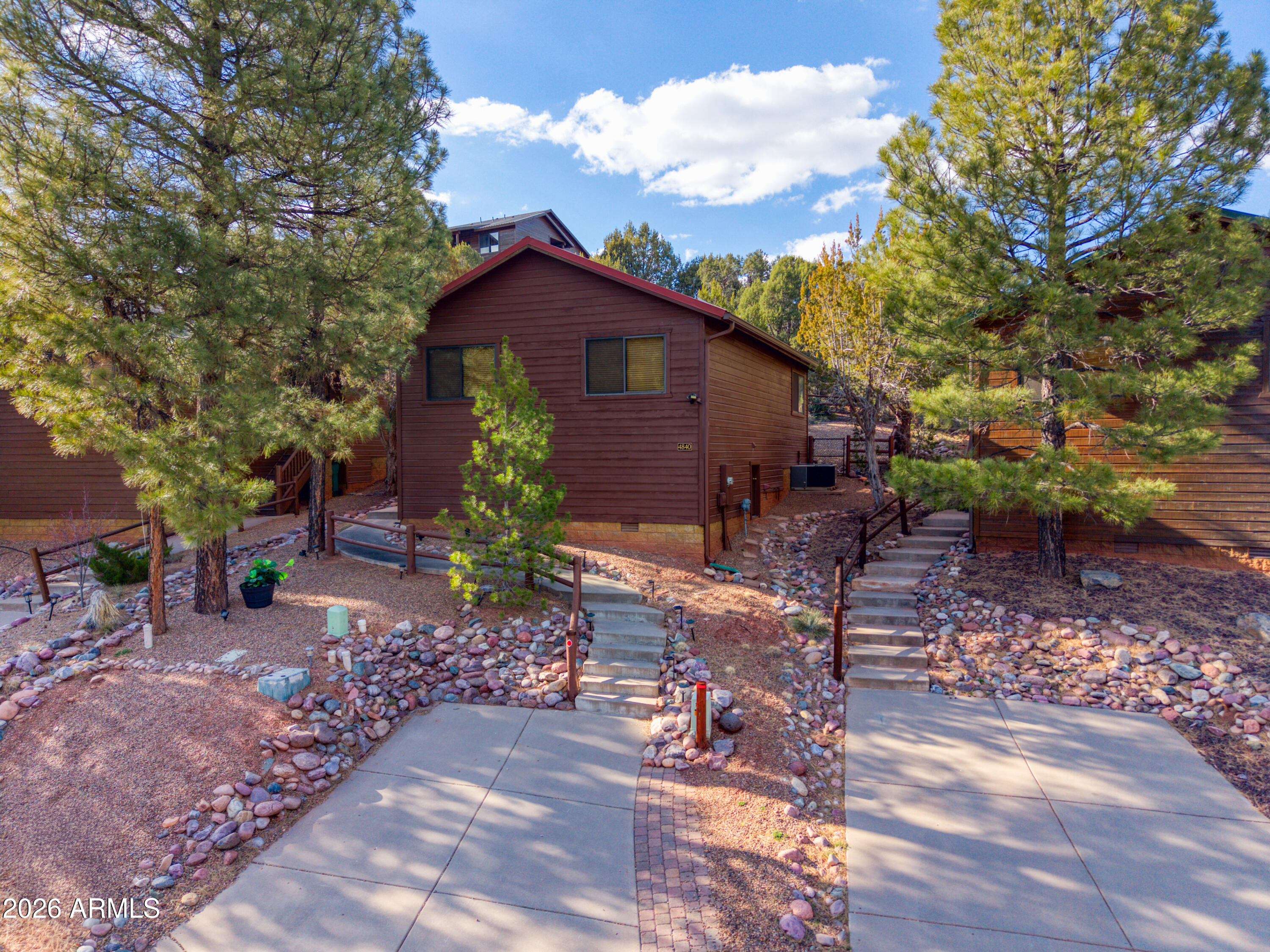 4840 West Cottage Loop Show Low, AZ 85901 - Photo 3 of 47 a view of a house with a yard