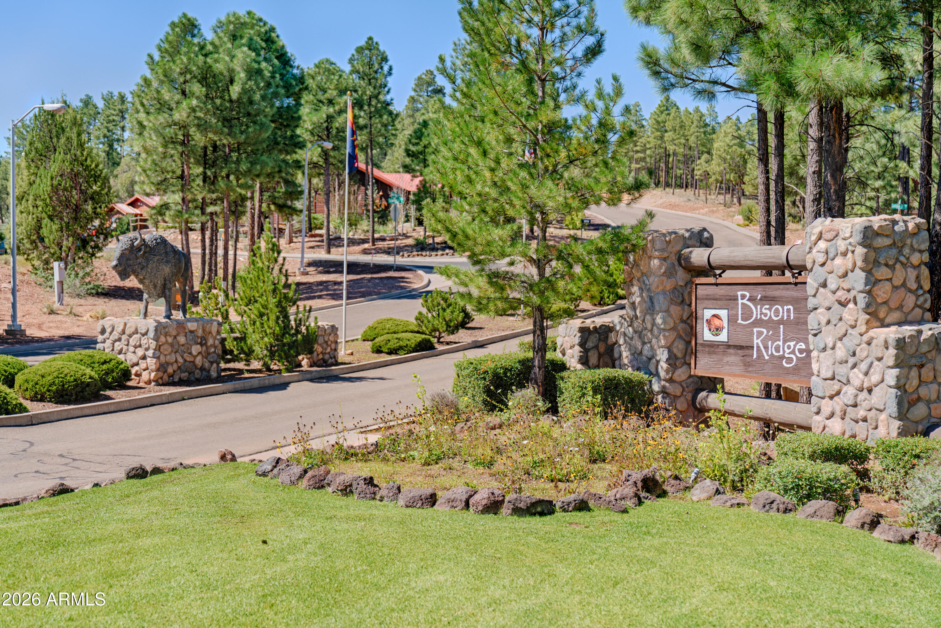 4840 West Cottage Loop Show Low, AZ 85901 - Photo 42 of 47 a front view of a house with garden