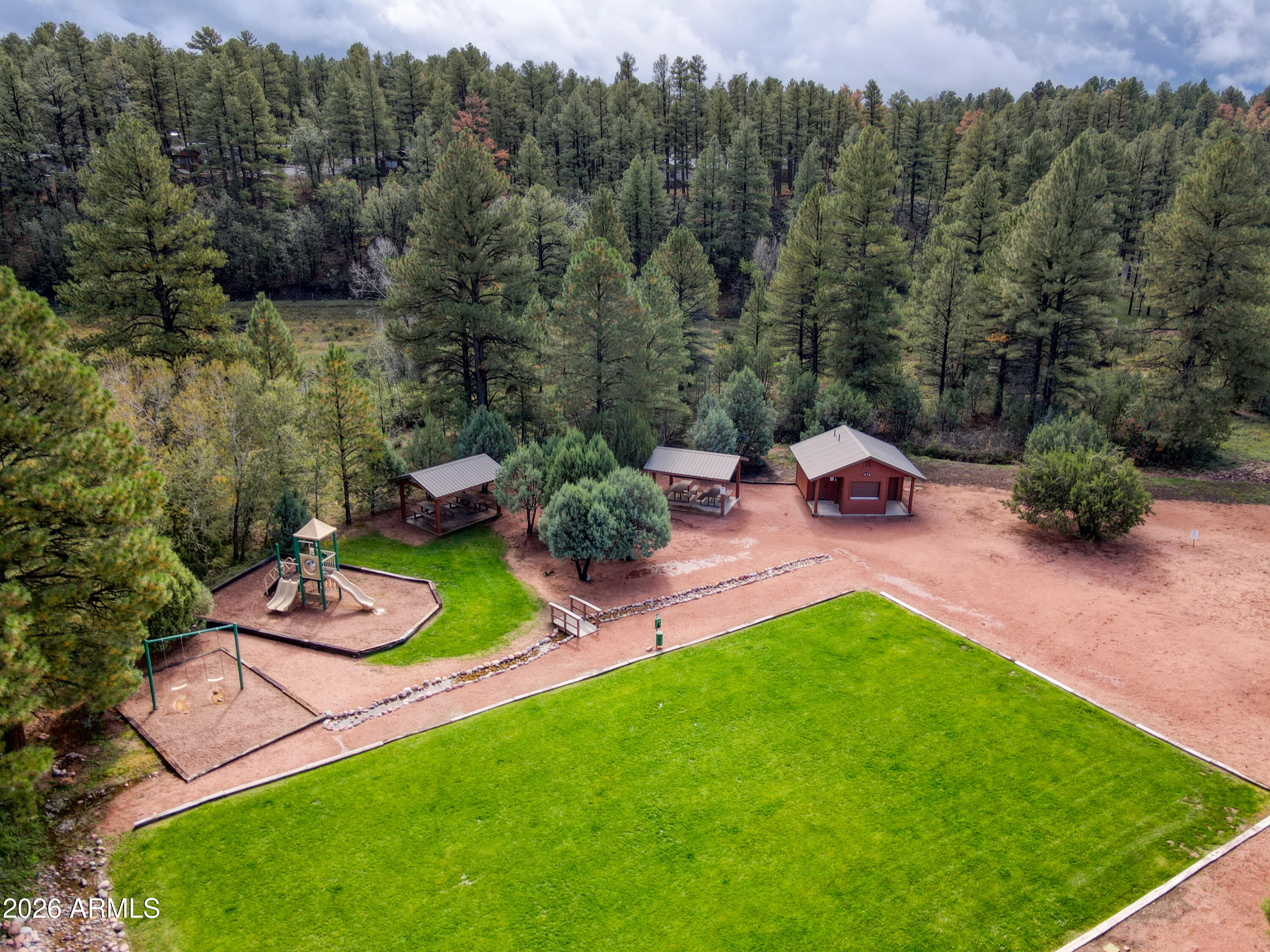 4840 West Cottage Loop Show Low, AZ 85901 - Photo 44 of 47 an outdoor space with furniture