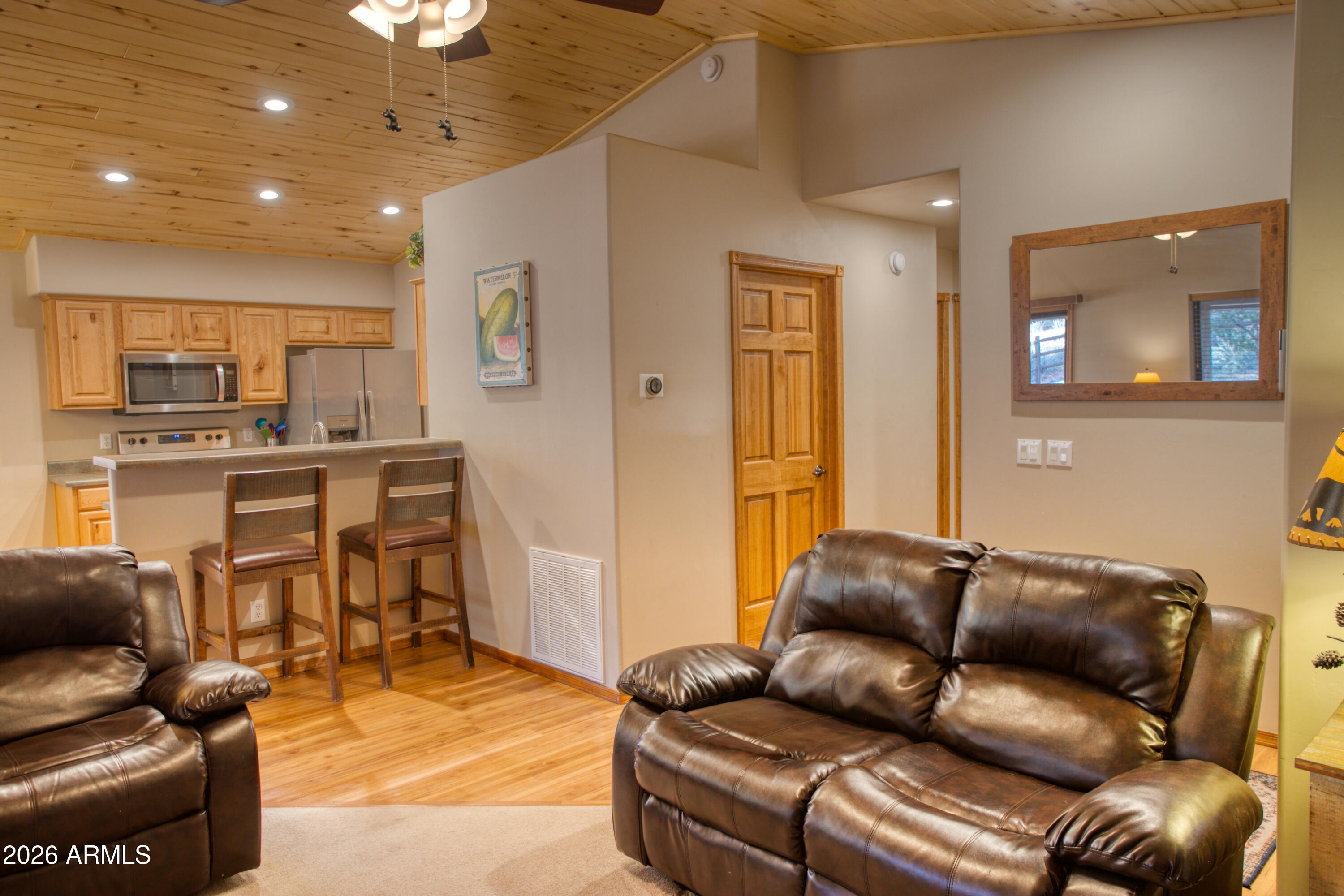 4840 West Cottage Loop Show Low, AZ 85901 - Photo 6 of 47 a living room with furniture and a kitchen view