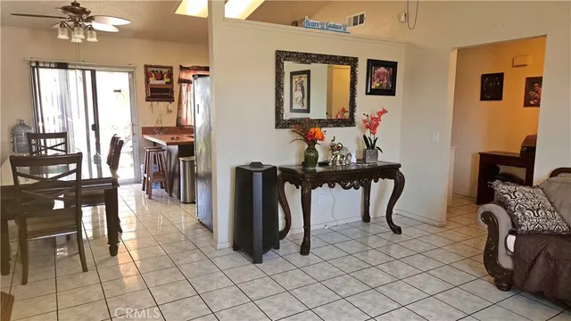 a view of a livingroom with furniture and window