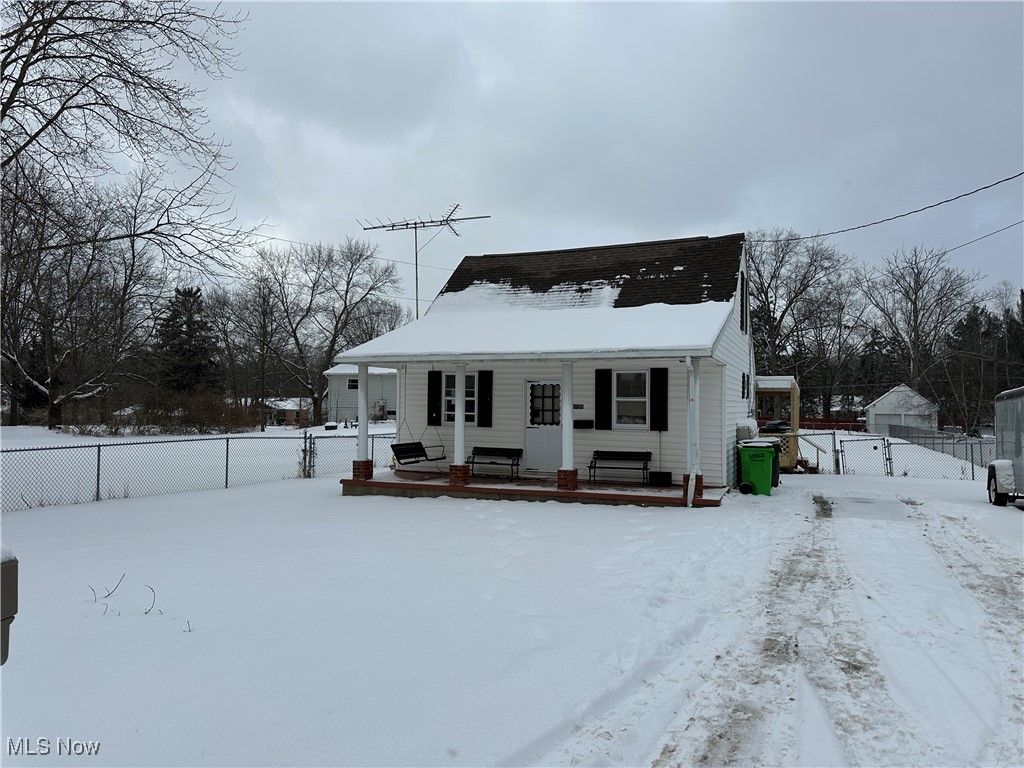 4058 Pardee Road Stow, OH 44224 - Photo 3 of 24 Snow covered rear of property with fence