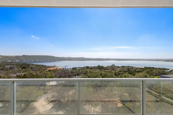 a view of a lake with a balcony