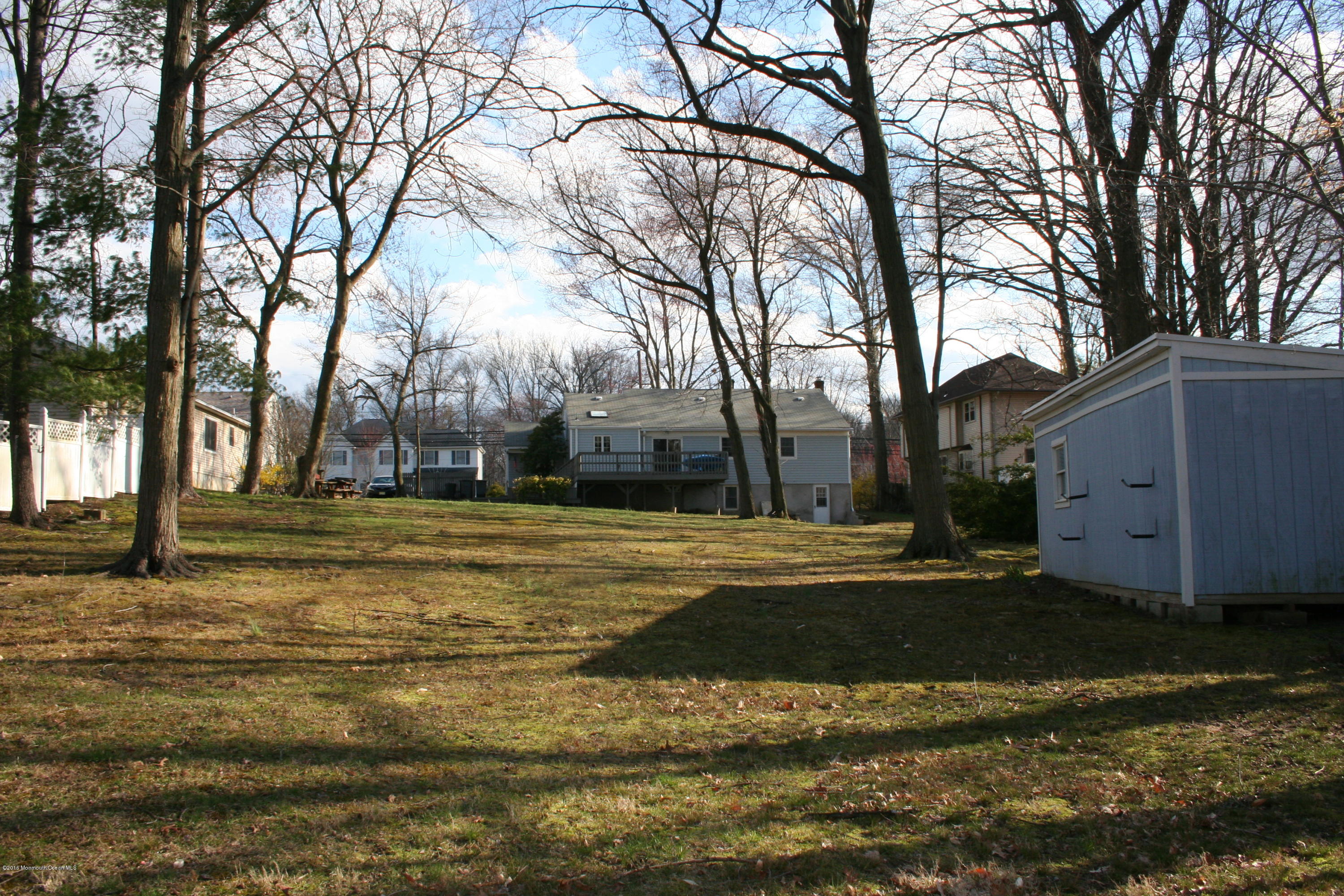 129 Aberdeen Road Aberdeen, NJ 07747 - Photo 22 of 28 a view of road with large trees