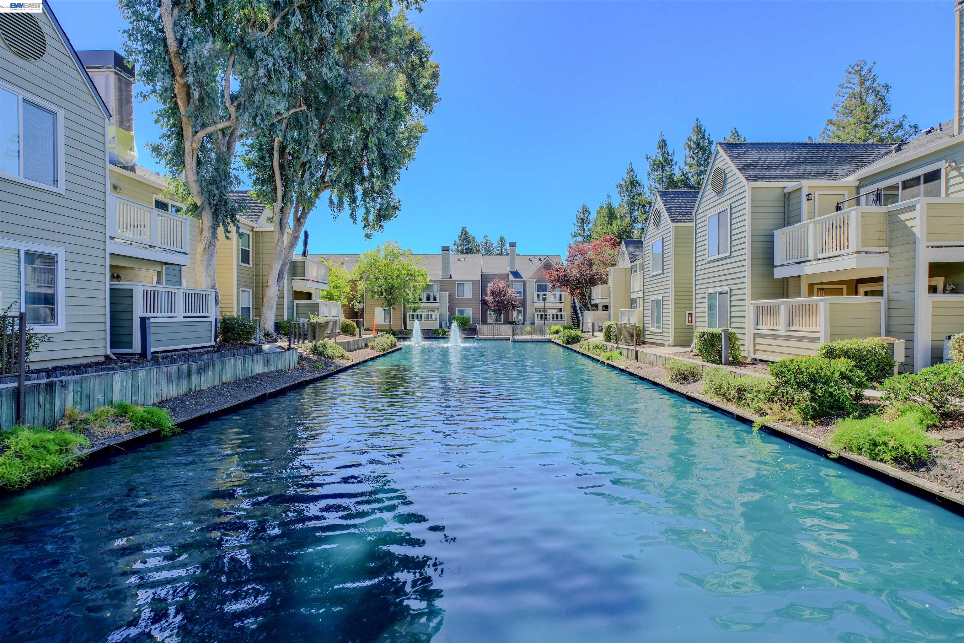 285 Reflections Drive, Unit 23 San Ramon, CA 94583 - Photo 2 of 34 a view of a house with a yard