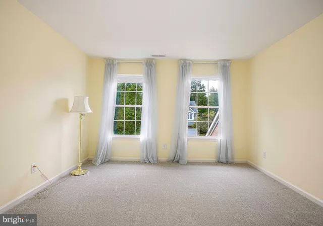 a kitchen with stainless steel appliances granite countertop wooden cabinets a sink and dishwasher