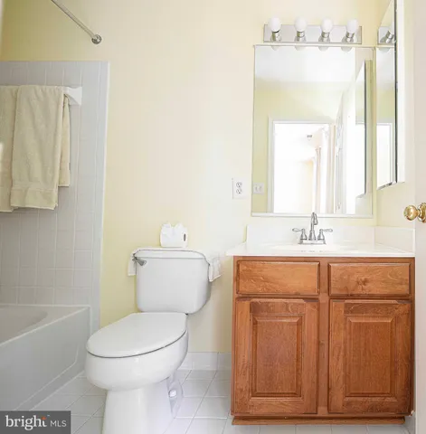 a view of an empty room with gym equipment