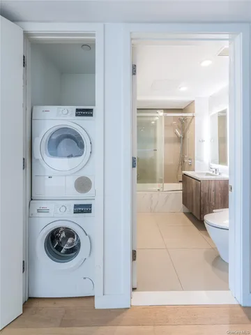 a en suite bathroom with a toilet and a sink