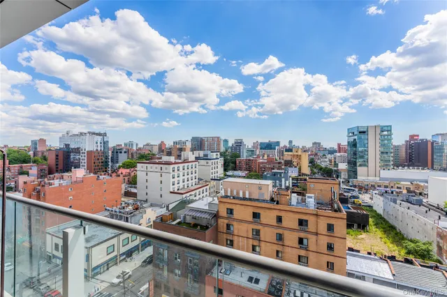 a view of a city from a balcony