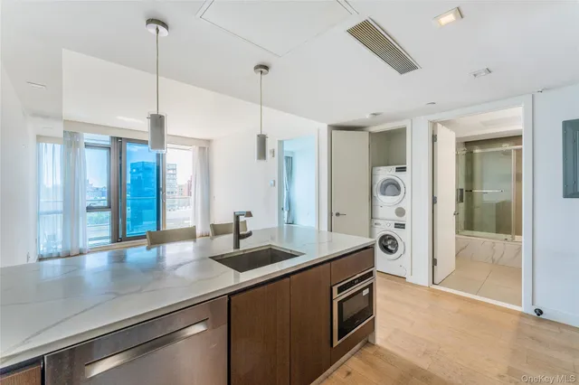 a kitchen with counter top space and a sink