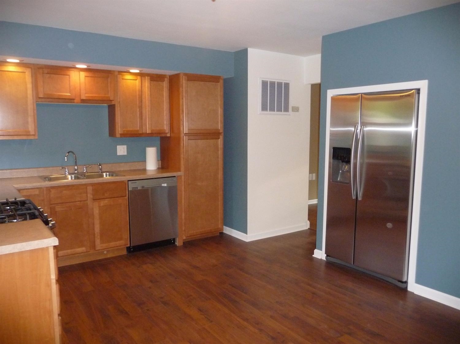 767 Fox River Road Valparaiso, IN 46385 - Photo 4 of 10 a view of a kitchen with a sink cabinet and a window