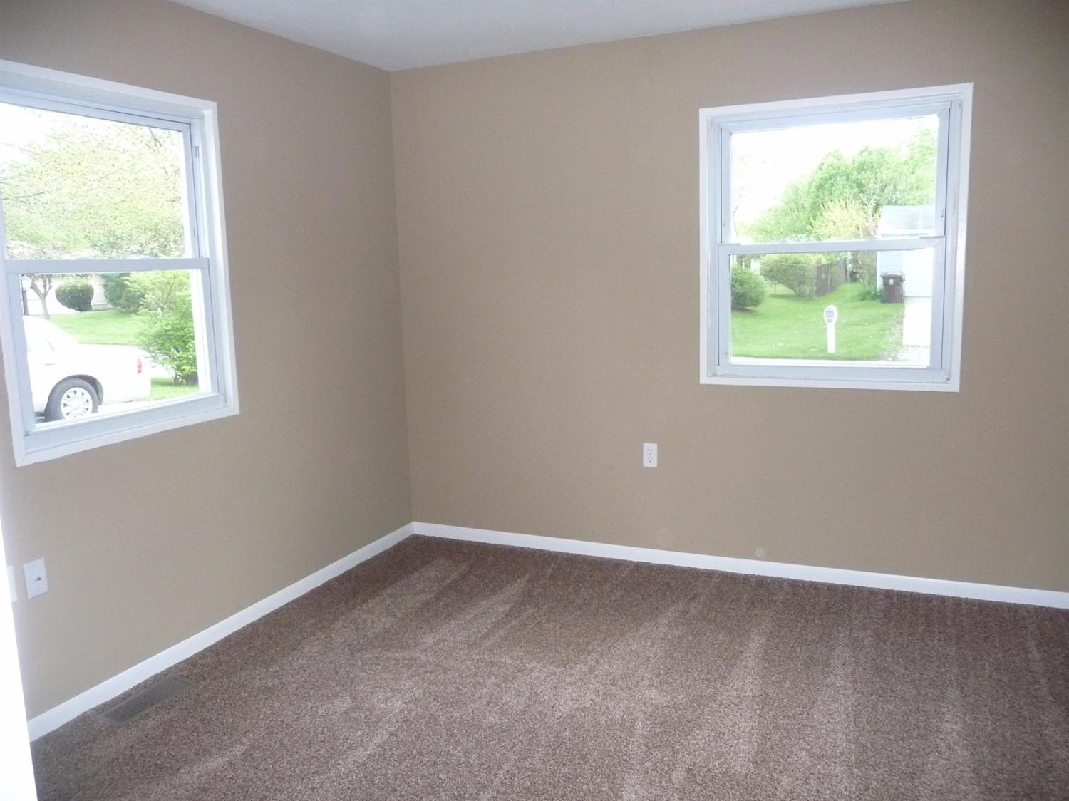 767 Fox River Road Valparaiso, IN 46385 - Photo 6 of 10 an empty room with a window