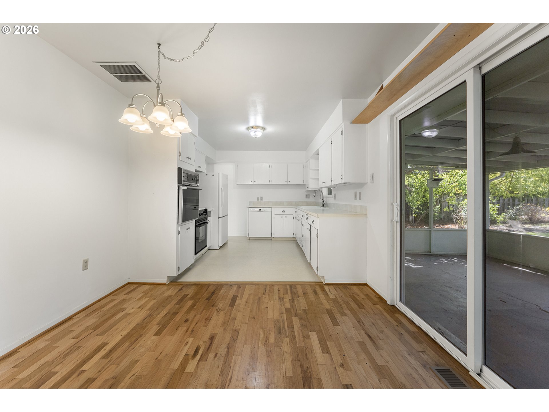 4355 Southwest 188th Avenue Beaverton, OR 97078 - Photo 12 of 42 a view interior of a house wooden floor and windows