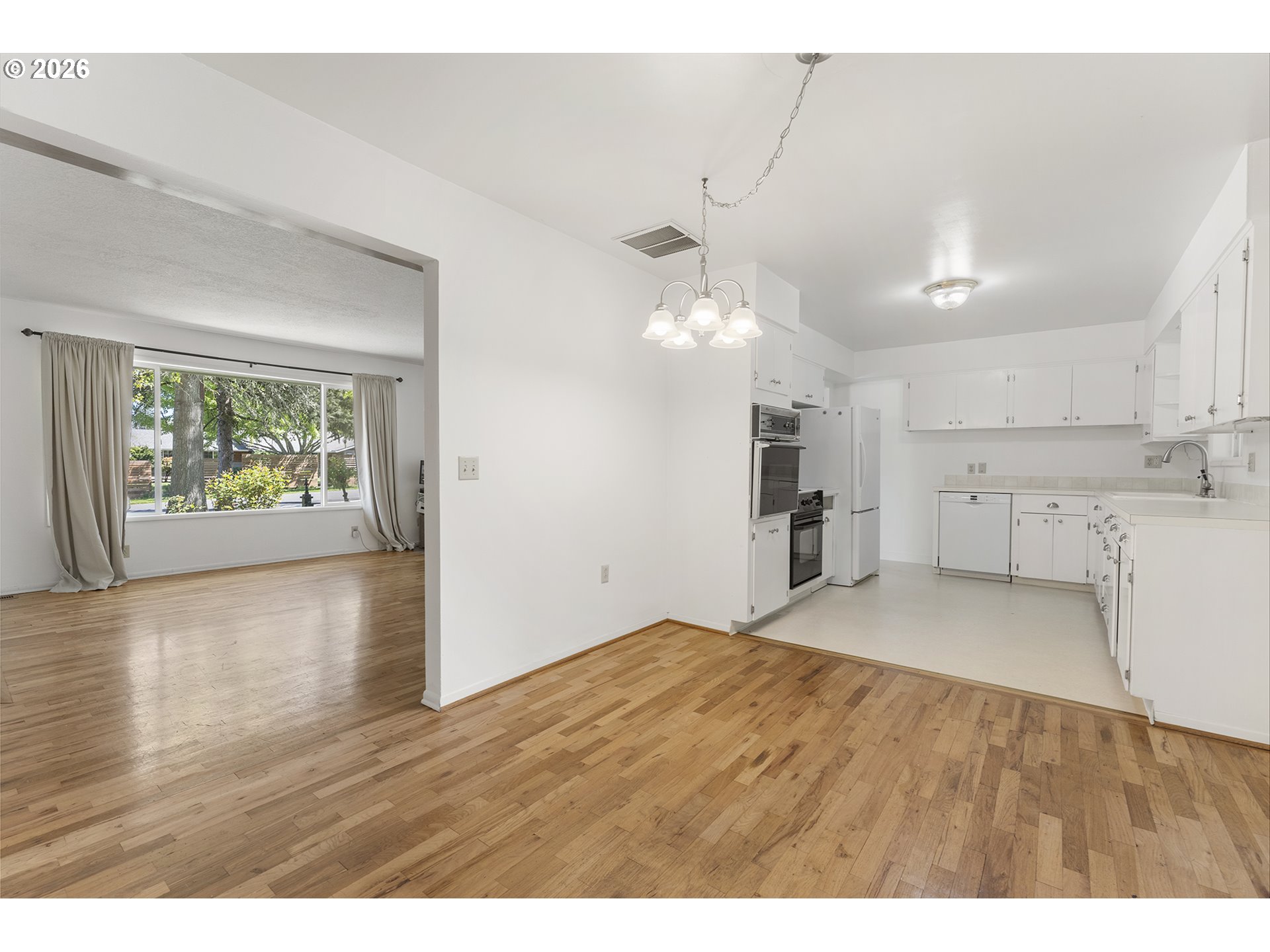4355 Southwest 188th Avenue Beaverton, OR 97078 - Photo 10 of 42 a view interior of a house natural light wood floor and appliances