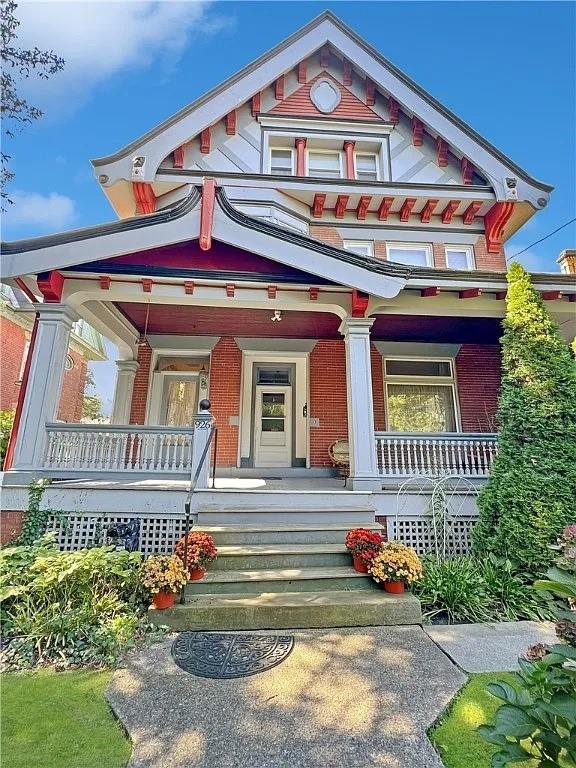 926 Savannah Avenue, Unit 3 Pittsburgh, PA 15221 - Photo 1 of 13 a front view of a house with a yard