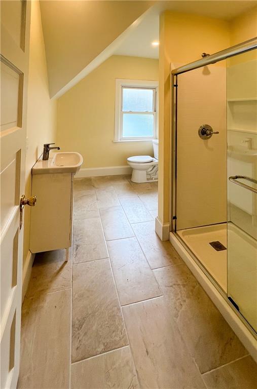 926 Savannah Avenue, Unit 3 Pittsburgh, PA 15221 - Photo 7 of 13 a bathroom with a sink and a mirror
