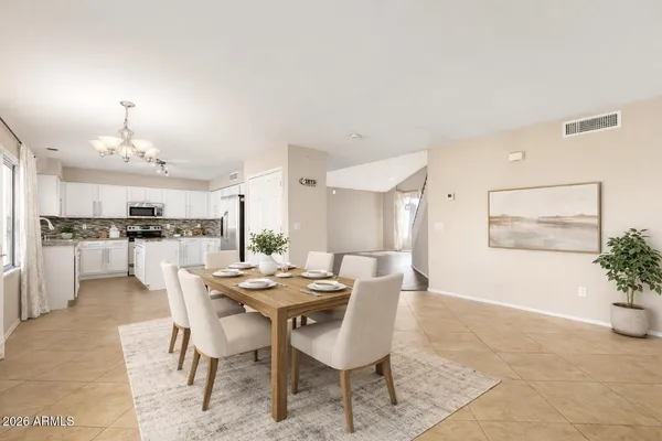 a view of a dining room with furniture