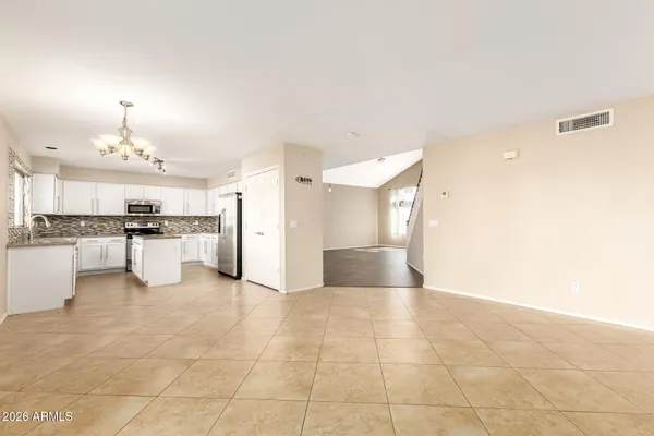 a view of a kitchen with a sink