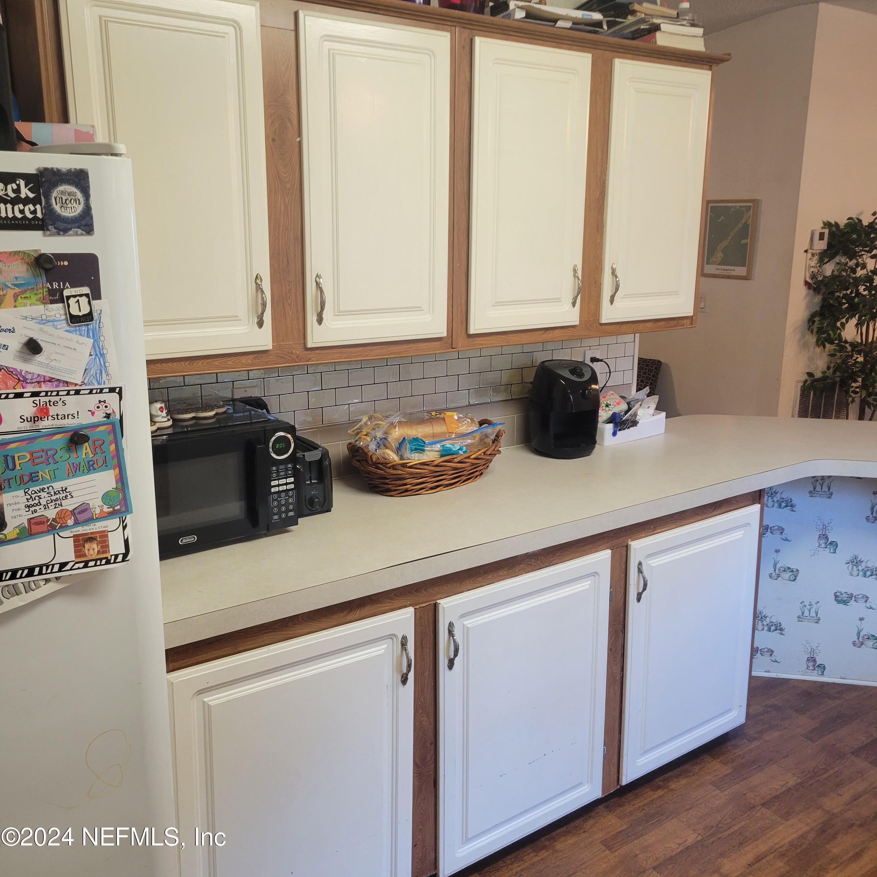 7616 Townsend Road Jacksonville, FL 32244 - Photo 15 of 38 a kitchen with a sink and cabinets
