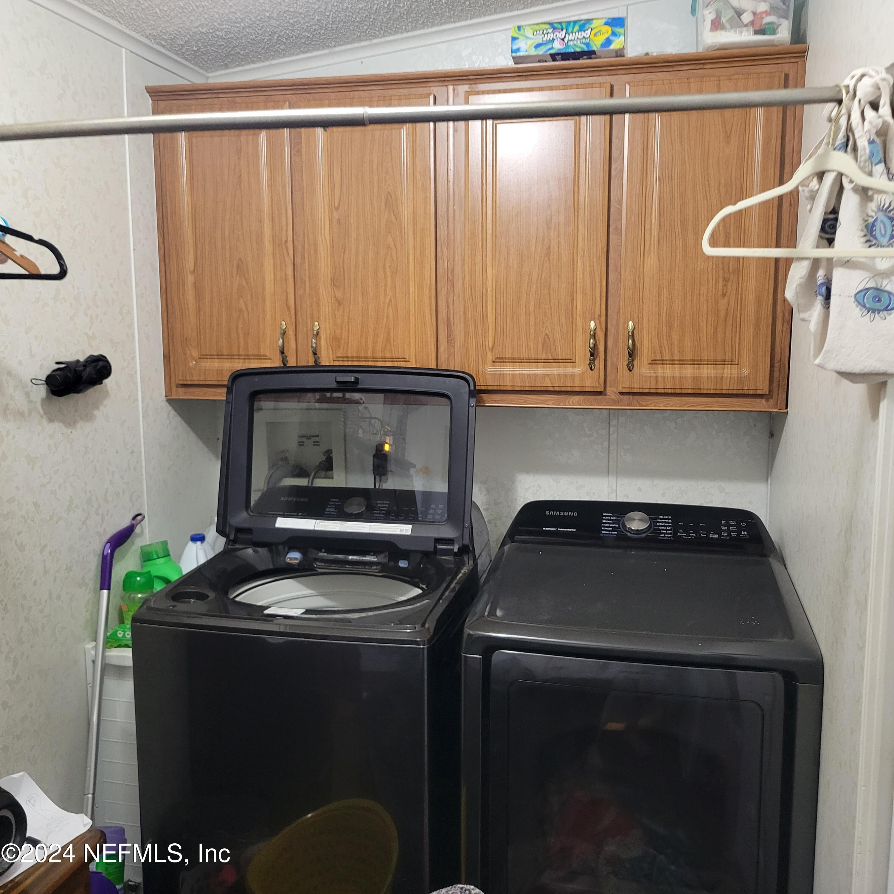 7616 Townsend Road Jacksonville, FL 32244 - Photo 18 of 38 a kitchen with a stove and a refrigerator