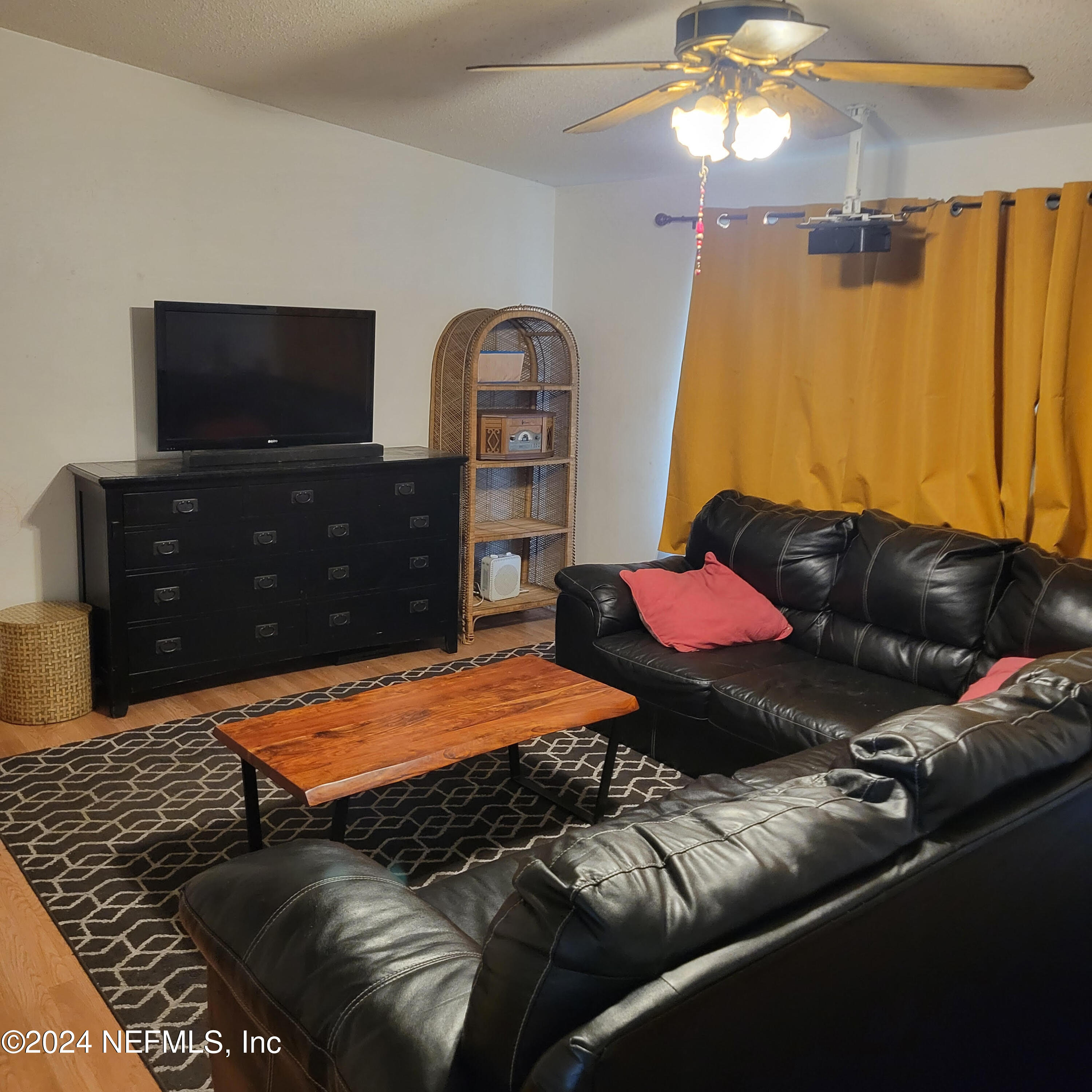 7616 Townsend Road Jacksonville, FL 32244 - Photo 21 of 38 a bedroom with a bed and a dresser