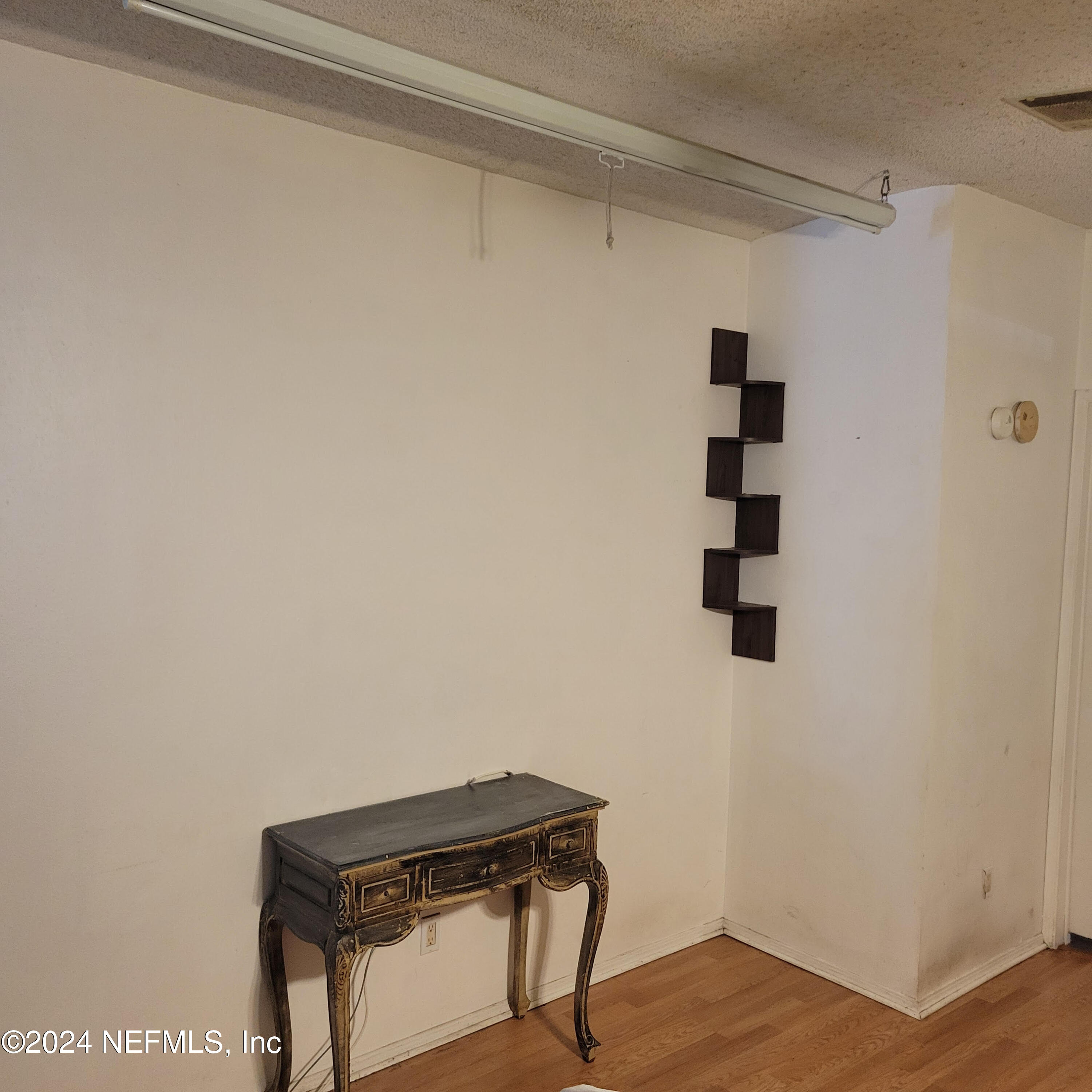 7616 Townsend Road Jacksonville, FL 32244 - Photo 22 of 38 a small space with a table and a window