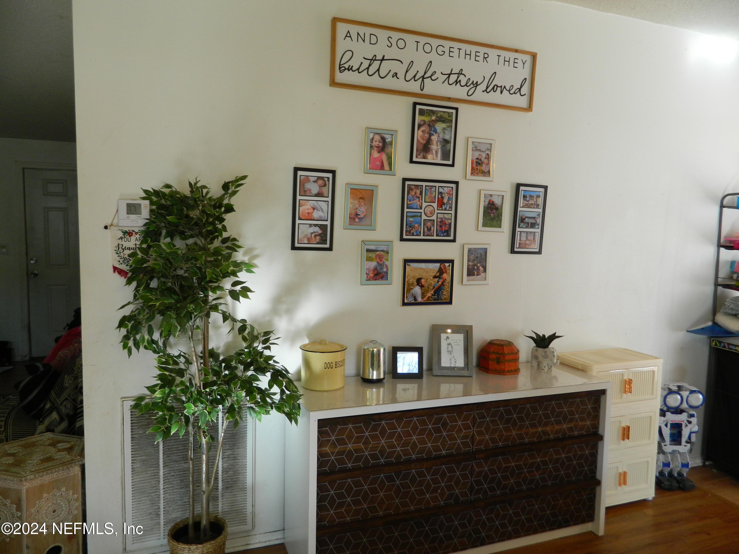 7616 Townsend Road Jacksonville, FL 32244 - Photo 23 of 38 a view of workspace with painting on the wall