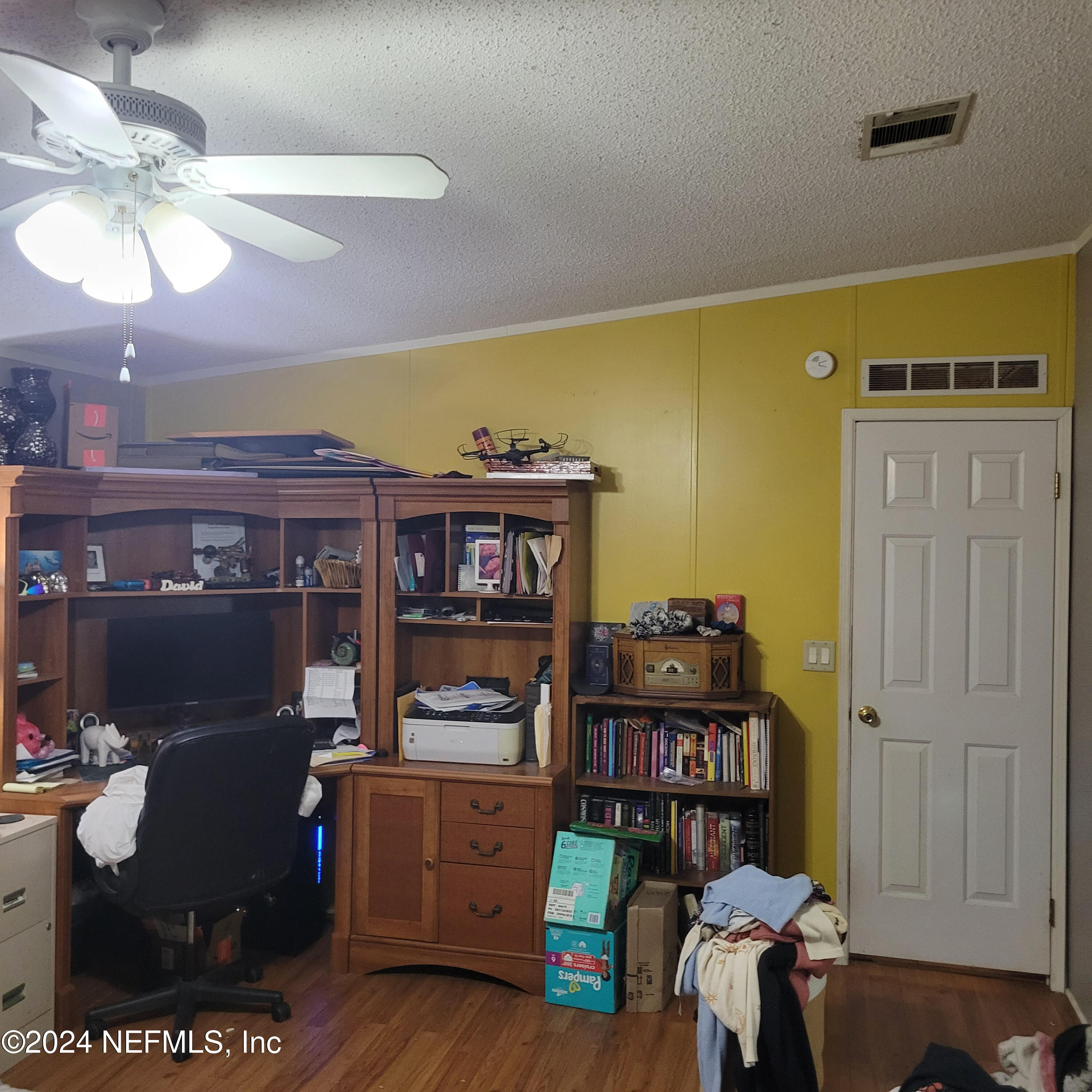 7616 Townsend Road Jacksonville, FL 32244 - Photo 27 of 38 a living room with furniture and a window