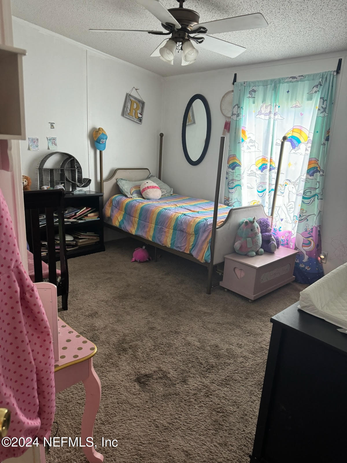 7616 Townsend Road Jacksonville, FL 32244 - Photo 33 of 38 a bedroom with furniture and a window