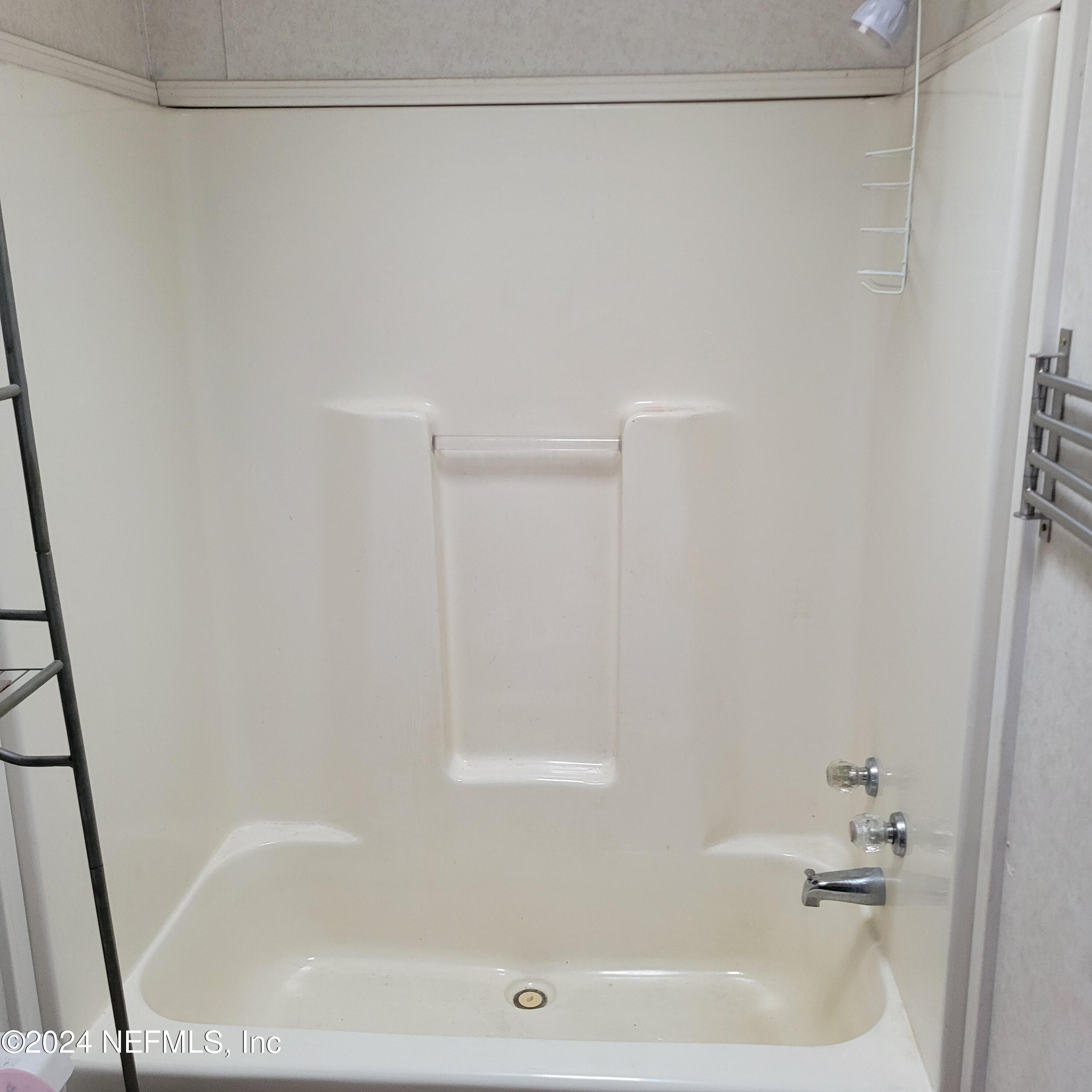 7616 Townsend Road Jacksonville, FL 32244 - Photo 38 of 38 a close view of a bathtub in a bathroom