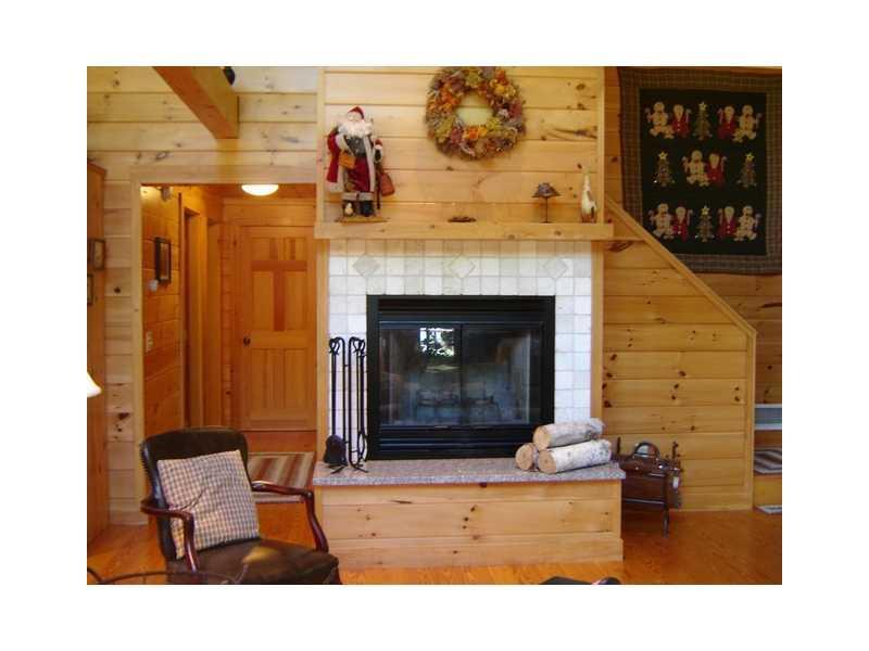 138 Beaver Brook Estates Rome, ME 04963 - Photo 11 of 23 Other. Tiled fireplace in living room