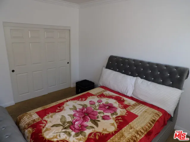 a bedroom with a bed