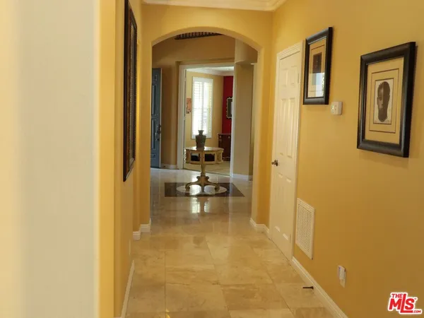 a view of a bathroom from a hallway