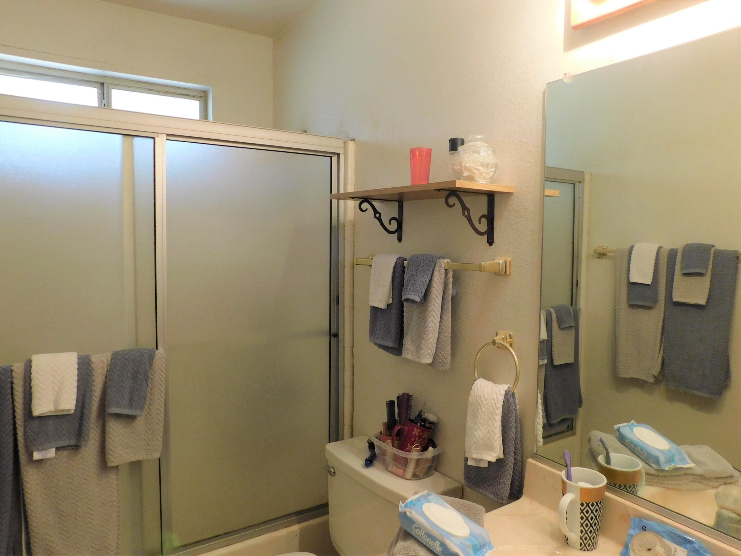 31601 Neuralia Road Mojave, CA 93519 - Photo 11 of 27 a bathroom with a shower and a sink
