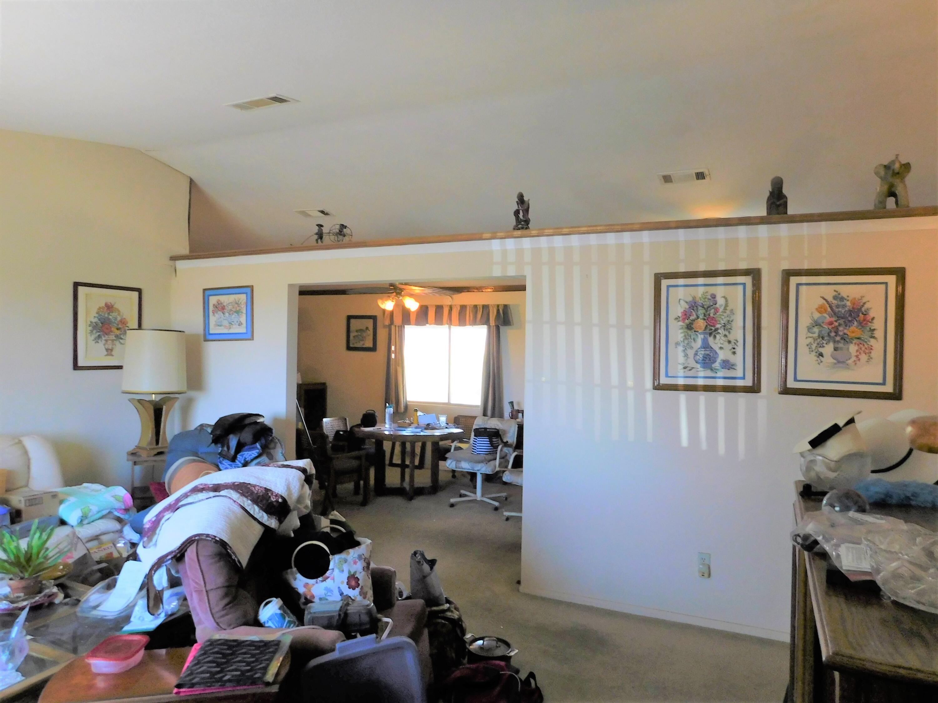 31601 Neuralia Road Mojave, CA 93519 - Photo 7 of 27 a living room with furniture and a window